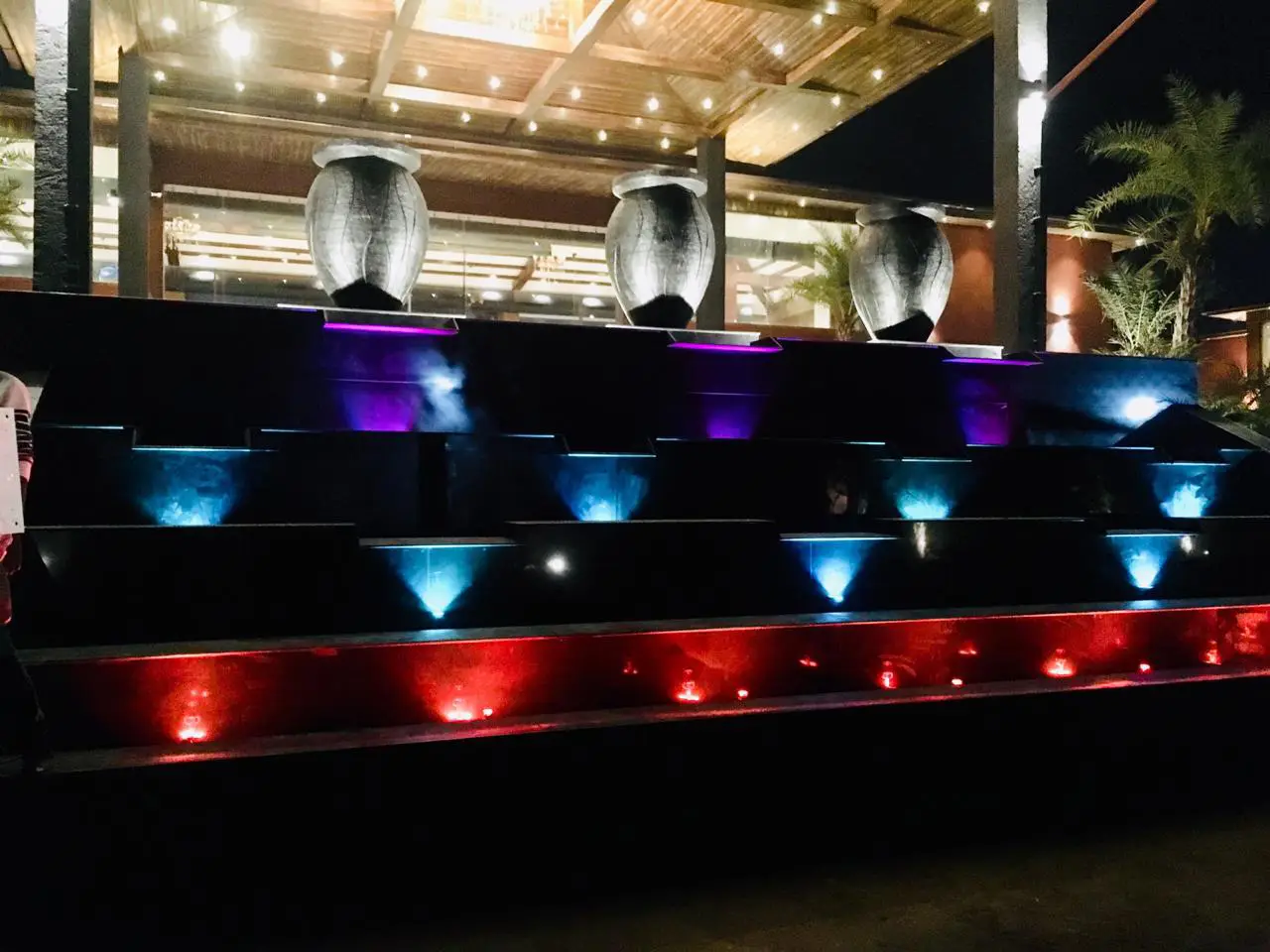 Decorative water feature with lighting for outdoor project