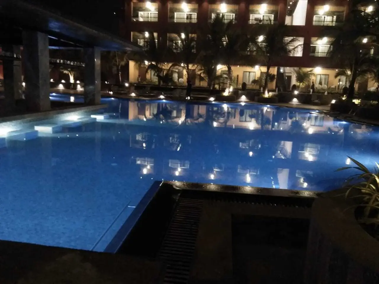 Swimming pool with blue night lighting